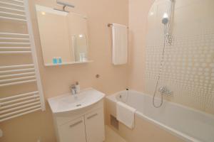 Kúpeľňa v ubytovaní Amaros Apartment