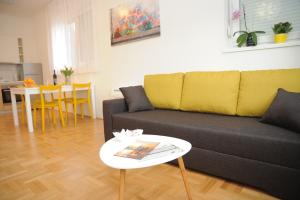 Posedenie v ubytovaní Amaros Apartment