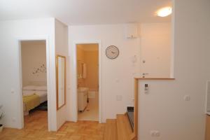 Posteľ alebo postele v izbe v ubytovaní Amaros Apartment