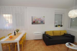 Posedenie v ubytovaní Amaros Apartment