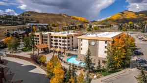 an aerial view of a city with a building at 1bd 272 Perfect Location with Pool in Crested Butte