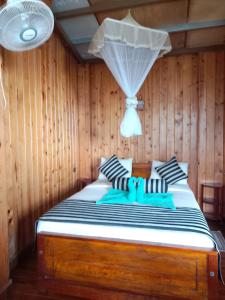 Postel nebo postele na pokoji v ubytování Sunray Homestay