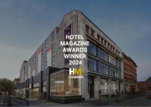 Et logo, certifikat, skilt eller en pris der bliver vist frem på Drifter Christchurch