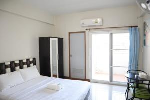 Un pat sau paturi într-o cameră la sk resort