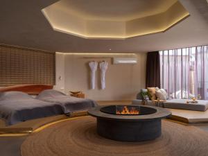 Kuvagallerian kuva majoituspaikasta 云渡雪山湖景民宿 Vento Snow Mountain Lake View B&B, joka sijaitsee kohteessa Lijiang
