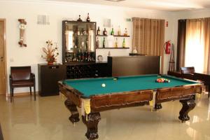a living room with a pool table in it at Hotel Rural Solar Das Freiras in Figueiró dos Vinhos