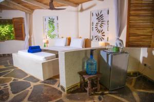 Area soggiorno di Firefly Eco Retreat