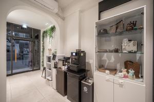 Kuchyň nebo kuchyňský kout v ubytování Elegance hotel hwangridan