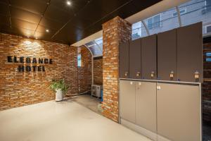 Kuchyň nebo kuchyňský kout v ubytování Elegance hotel hwangridan