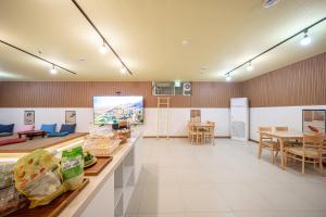 Kuchyň nebo kuchyňský kout v ubytování Elegance hotel hwangridan