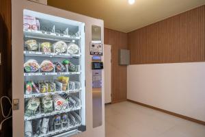 Kuchyň nebo kuchyňský kout v ubytování Elegance hotel hwangridan