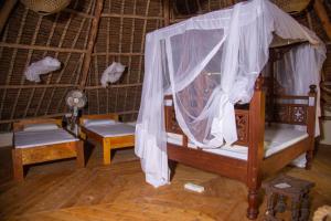 Letto o letti in una camera di Firefly Eco Retreat