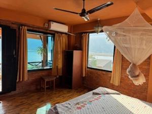 Postelja oz. postelje v sobi nastanitve Nar-Bis Hotel