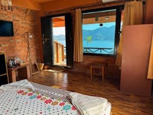Postelja oz. postelje v sobi nastanitve Nar-Bis Hotel