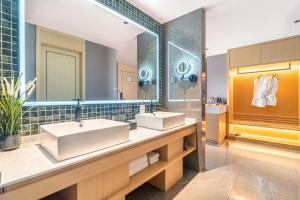 Koupelna v ubytování Country Inn & Suite by Radisson, Kunming Changshui International Airport