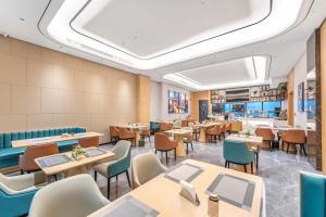 Restaurace v ubytování Country Inn & Suite by Radisson, Kunming Changshui International Airport
