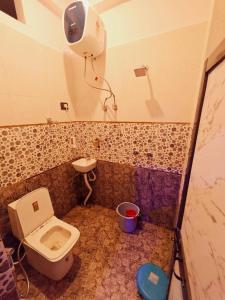 Vannituba majutusasutuses Krishna home stay