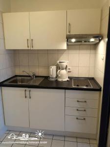Kuchyň nebo kuchyňský kout v ubytování 34 Ferienwohnung App.58-410