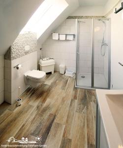 Koupelna v ubytování 37 Ferienwohnung an der Reiterkoppel 45b OG