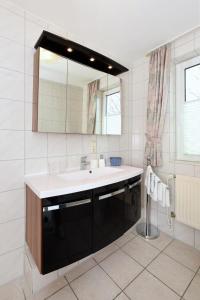 Ванная комната в Haus Kajedeich FeWo Krabbe