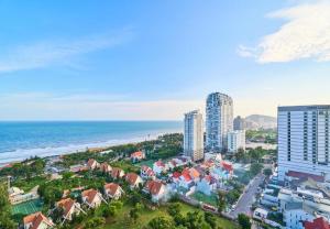 an aerial view of a city and the ocean at The Sóng Vũng Tàu - Thương's Homestay in Vung Tau