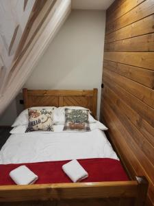 Ένα ή περισσότερα κρεβάτια σε δωμάτιο στο Apartament GubalowskiLasPremium