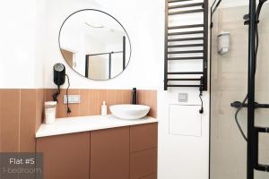 Et badeværelse på Dandelion Apartments Elegance