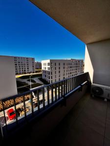 a balcony with a view of a parking lot at Apartmán Tatiana in Trnava