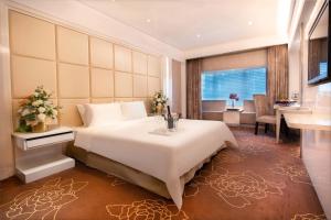 Voodi või voodid majutusasutuse Rio Hotel toas