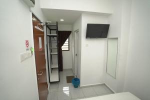 TV a/nebo společenská místnost v ubytování Gemilang Hotel Klang + 35 fotografií