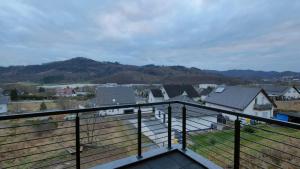 a view of a city from a balcony at Moderne Penthouse mit großer Terasse in Bad Laasphe
