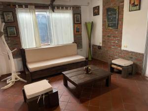 Posezení v ubytování Casa y Restaurante- Pizzeria La Pergola