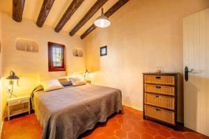 Postel nebo postele na pokoji v ubytování Casa Senrramada