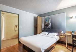 Postel nebo postele na pokoji v ubytování B&B HOTEL Morlaix