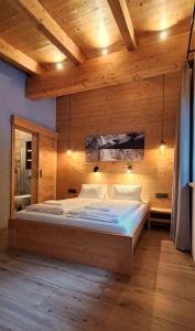 Posteľ alebo postele v izbe v ubytovaní Chalet Slovensky Raj
