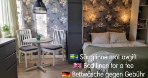 Postel nebo postele na pokoji v ubytování Mysig 1a med Minispa, 20 min från Kinnekulle