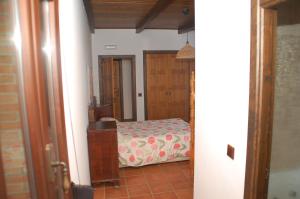 Łóżko lub łóżka w pokoju w obiekcie Casa rural Dalia
