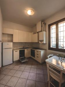 Køkken eller tekøkken på casa vacanze medicina 3