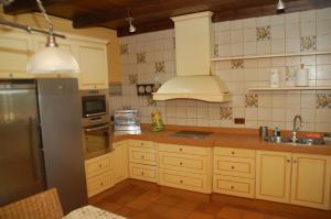 Kuchnia lub aneks kuchenny w obiekcie Casa rural Dalia