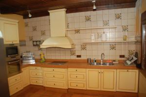 Kuchnia lub aneks kuchenny w obiekcie Casa rural Dalia