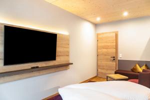 Televízia a/alebo spoločenská miestnosť v ubytovaní Hotel zum Schwanen - Appartement 1