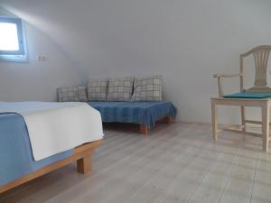 Ένα ή περισσότερα κρεβάτια σε δωμάτιο στο Sea view house Avgi