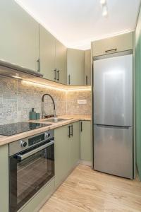 Kuchyň nebo kuchyňský kout v ubytování Tzortzatos Tiny Home