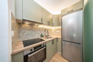 Kuchyň nebo kuchyňský kout v ubytování Tzortzatos Tiny Home