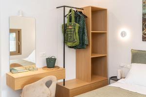 Postel nebo postele na pokoji v ubytování Tzortzatos Tiny Home
