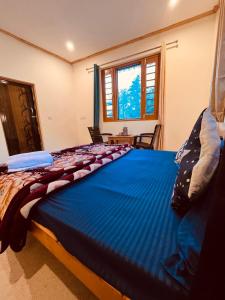 Skyard Hostel Harshil Valley客房内的一张或多张床位