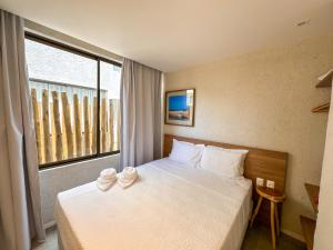 En eller flere senge i et værelse på Casa Piscina Privativa I Capela I Mar 100 metros + 99 billeder