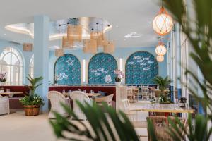 Reštaurácia alebo iné gastronomické zariadenie v ubytovaní Amadria Park Apartments Šibenik