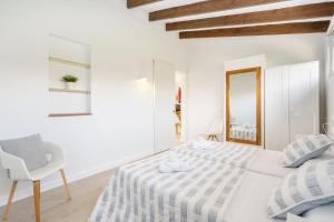 A bed or beds in a room at Villa Bini Chic