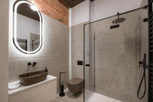 Ένα μπάνιο στο Merchants - Apartamenty Kupieckie with free parking